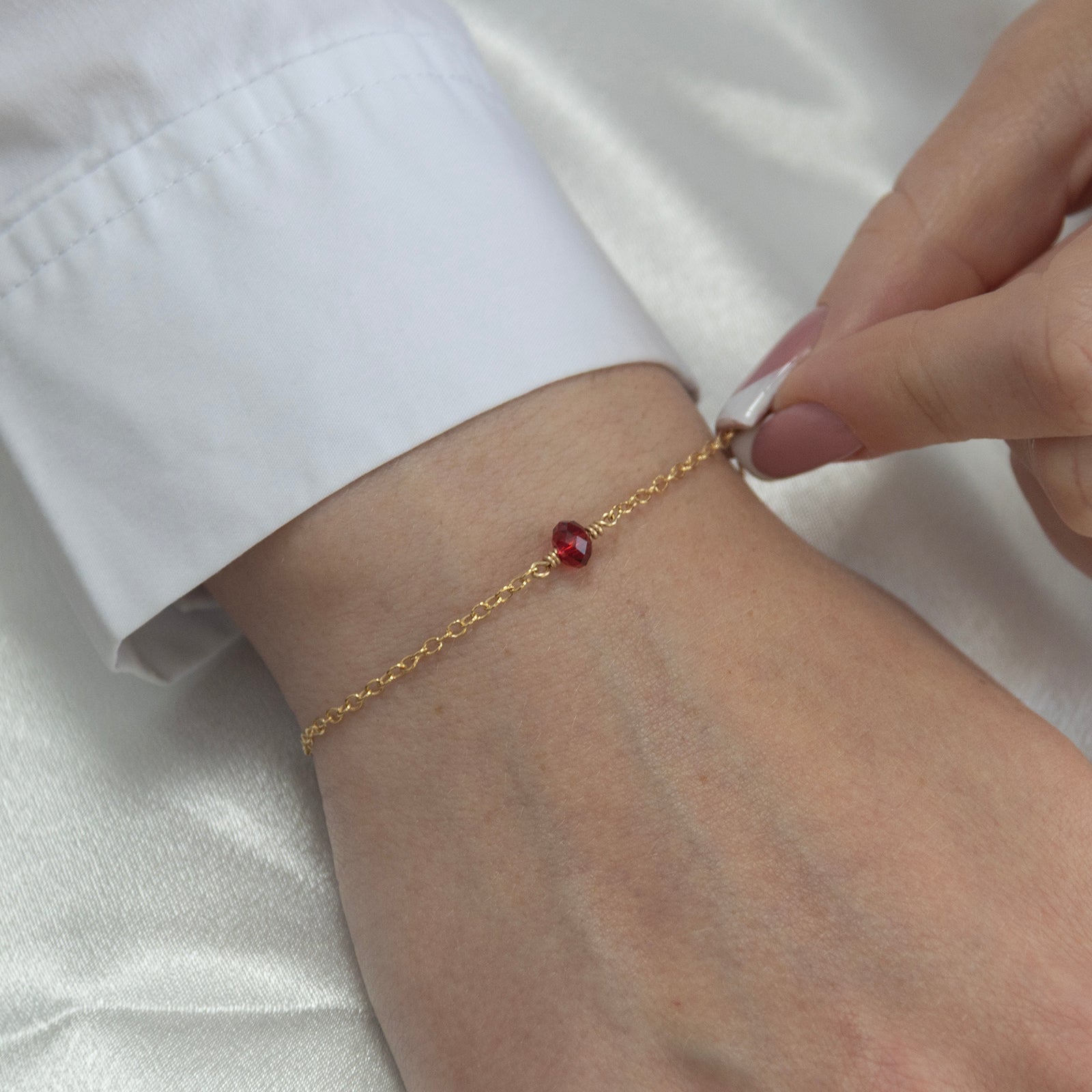 january birthstone bracelet gold on a model 