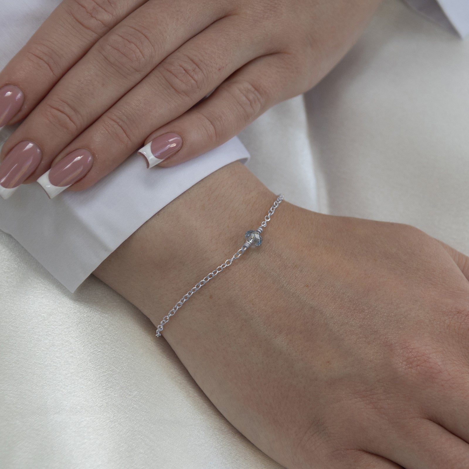 March_birthstone_bracelet_silver_on_a_model