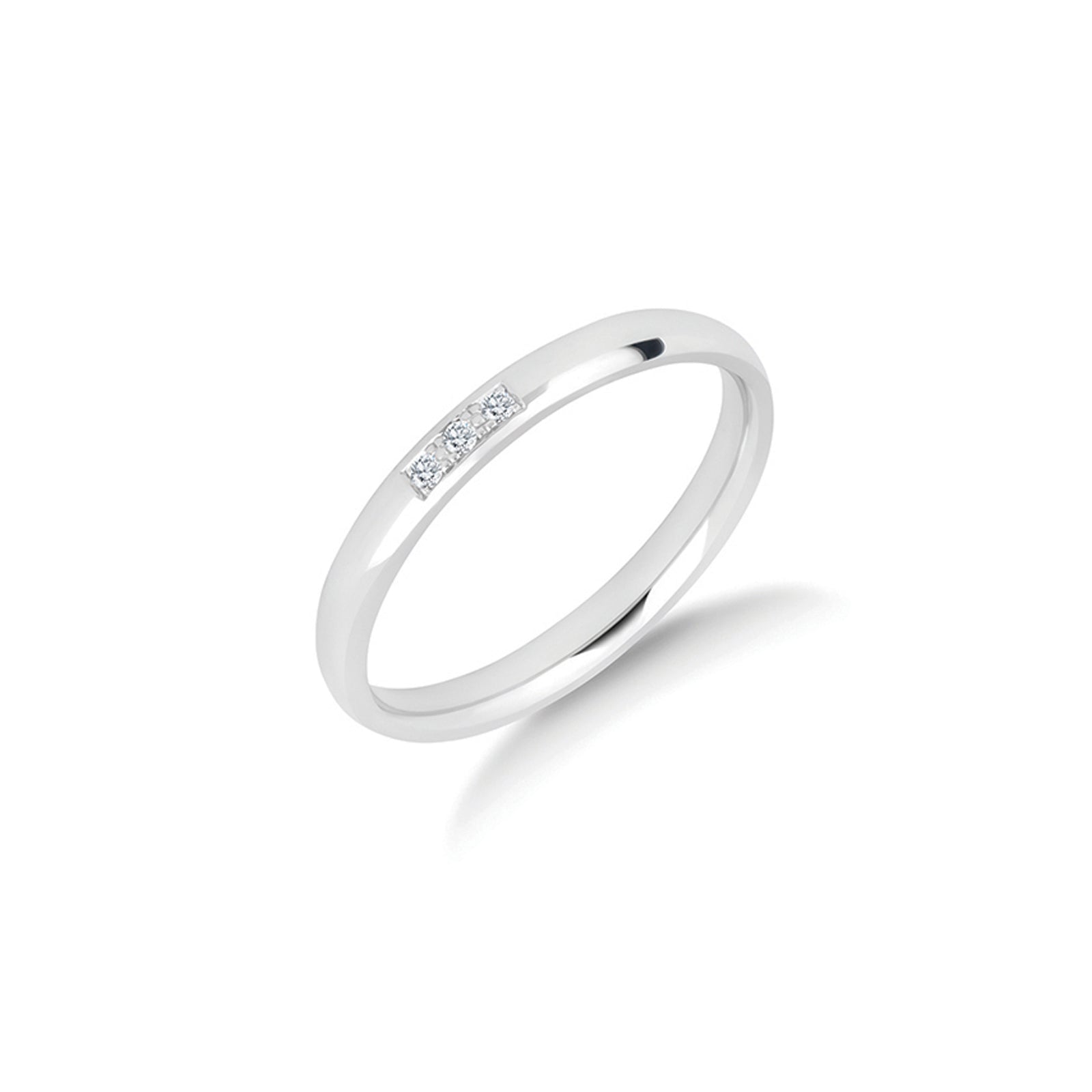 The Anam Cara diamond wedding ring in platinum, three pavé set diamonds together in one small line across a slender 2.5mm ring