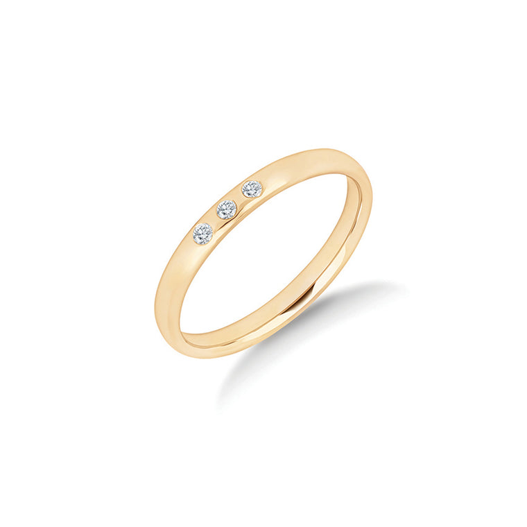 The Ever Since diamond wedding ring in yellow gold, three rub-over set diamonds in a line across a slender 2.5mm ring