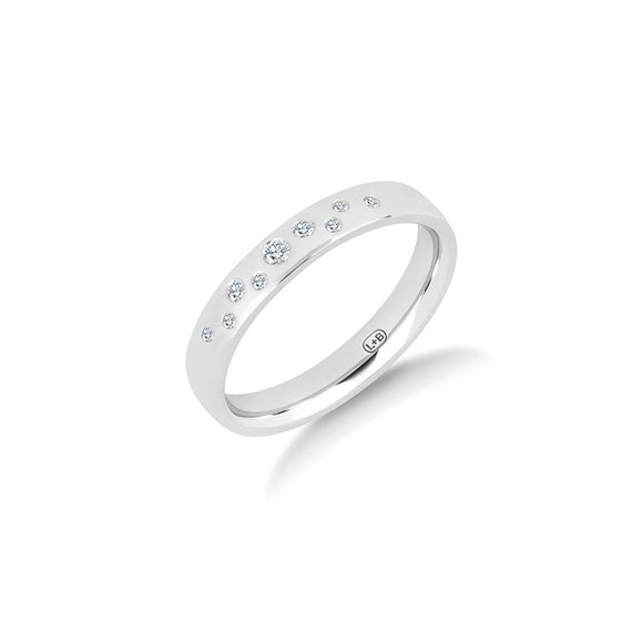 The Night Sky diamond wedding ring in yellow gold, nine lab-grown diamonds scattered across a 3.3mm polished ring