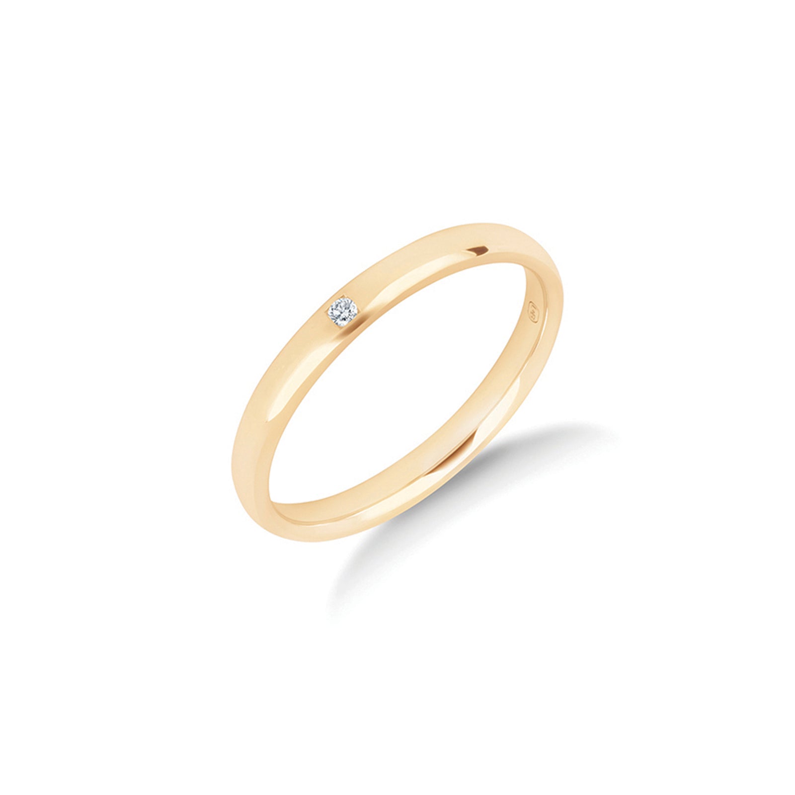 The Solas diamond wedding ring in yellow gold, a single channel set diamond in a slender 2.5mm polished ring