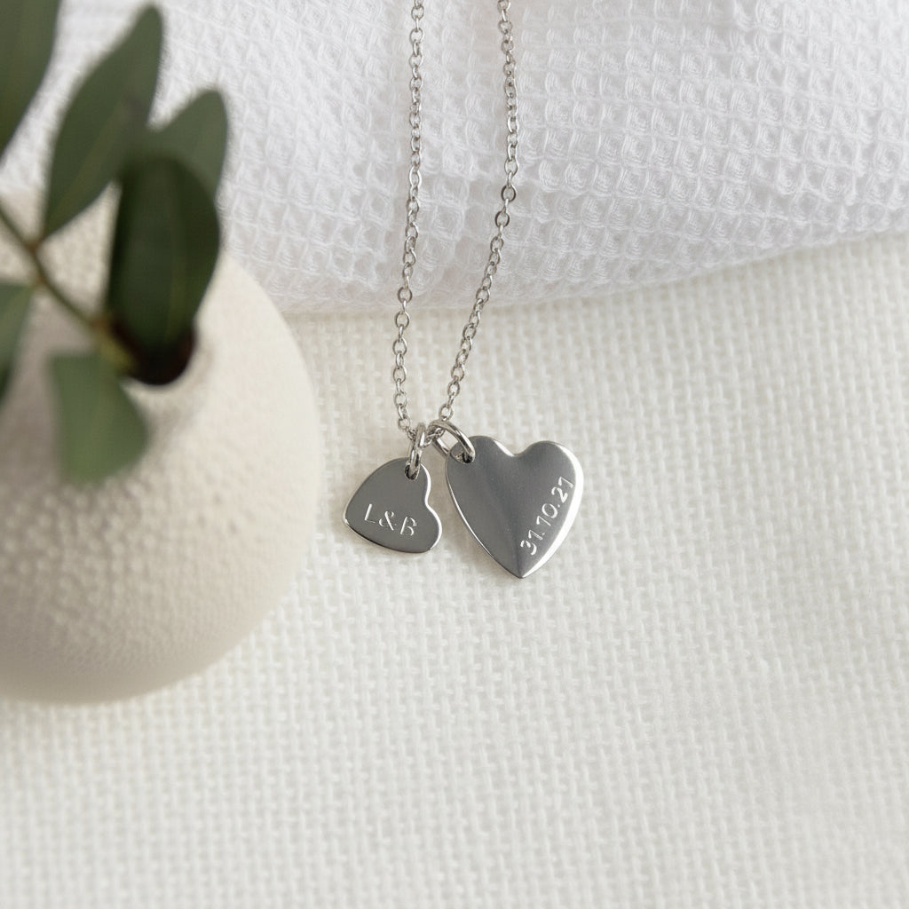 double heart with initial and date necklace silver. lulu and belle