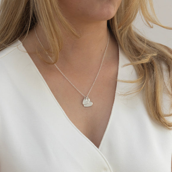 silver double heart necklace with initial and date 