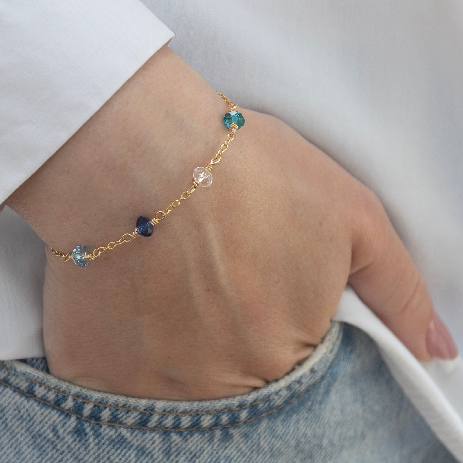 family birthstone bracelet 4 birthstones on a model 