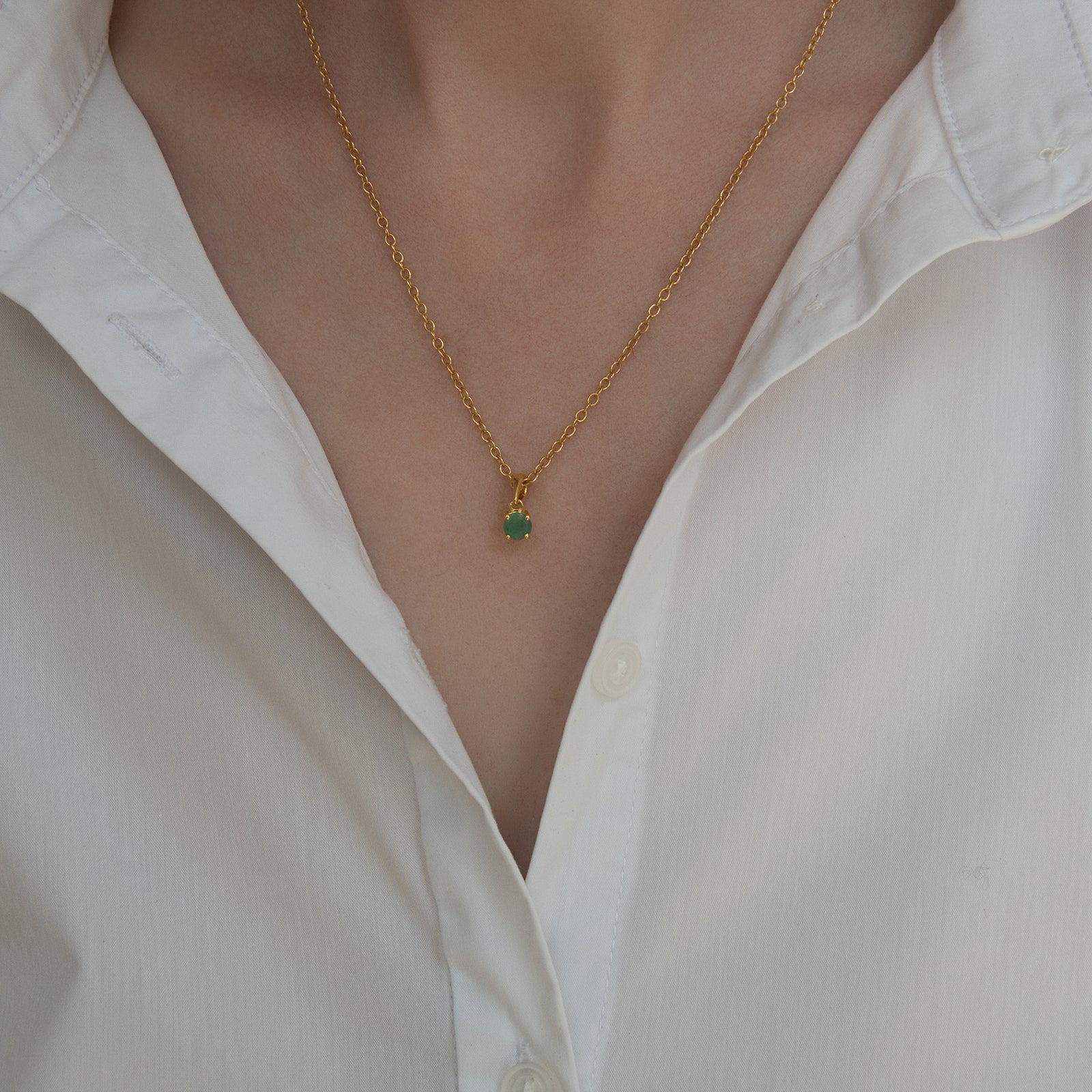 gold emerald birthstone pendant
