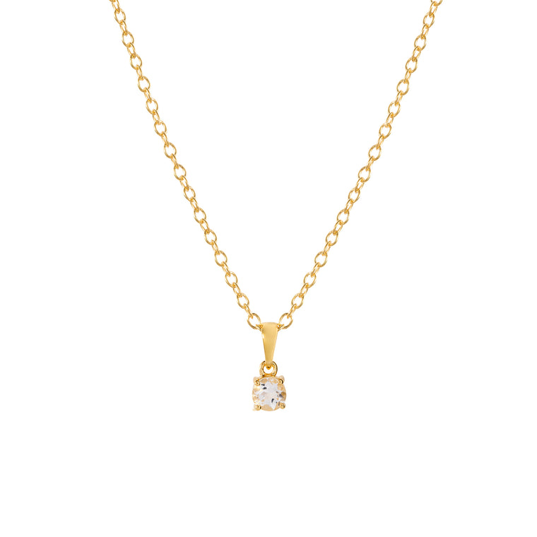 Gold crystal quartz pendant necklace, April birthstone jewellery by Lulu + Belle