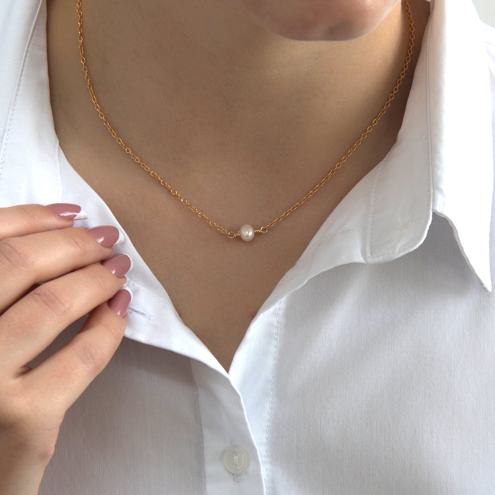 june birthstone necklace gold on a model 