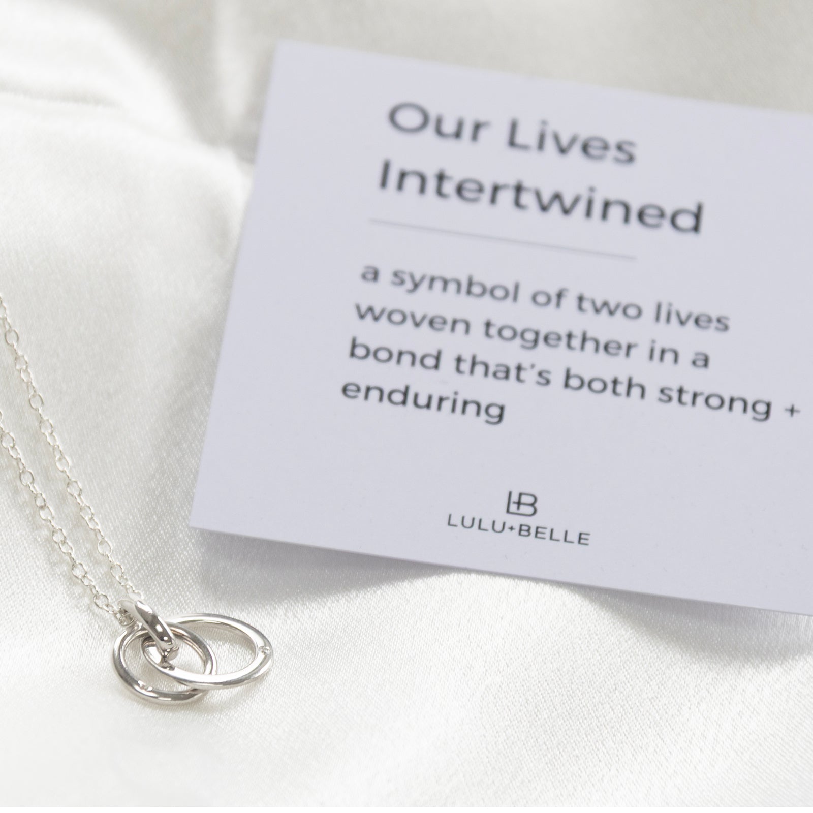 kindred interlocking circles necklace with diamonds and meaning card 