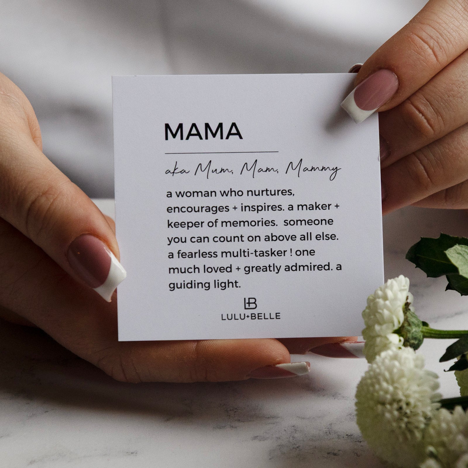 mama meaning card in a models hand 