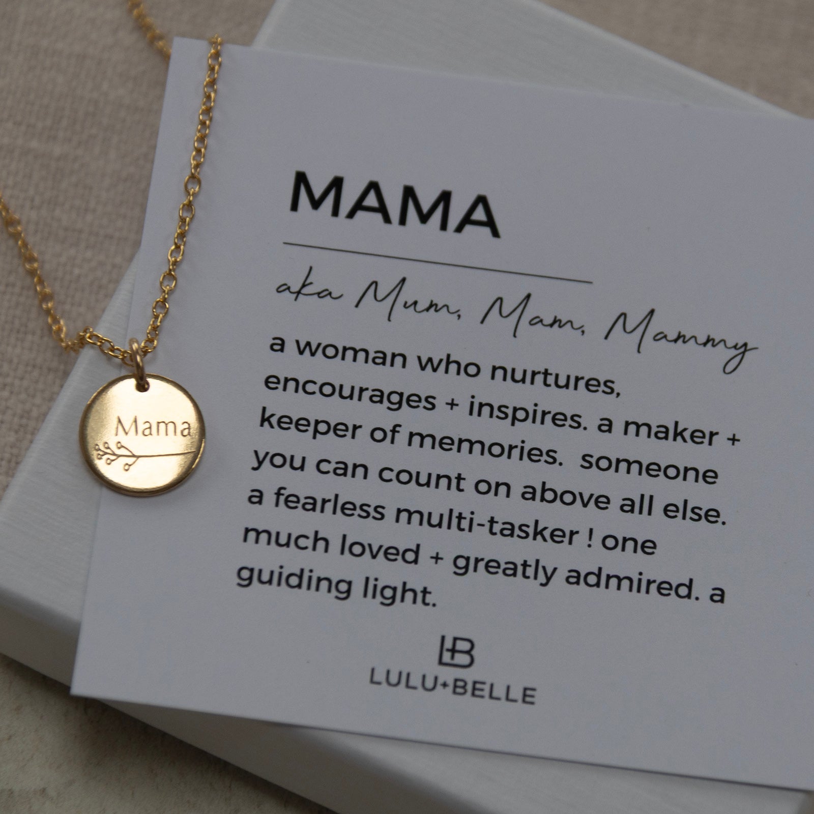 botanical mama necklace on the meaning card and box 