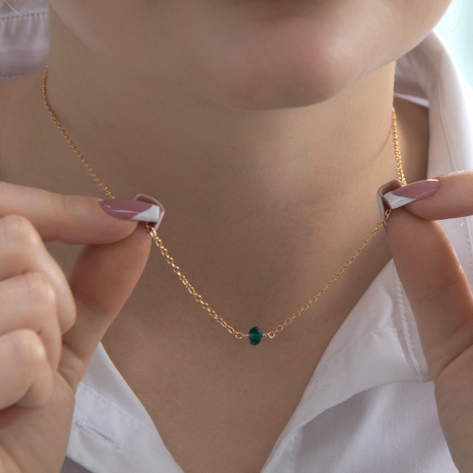 may birthstone necklace gold on a model 
