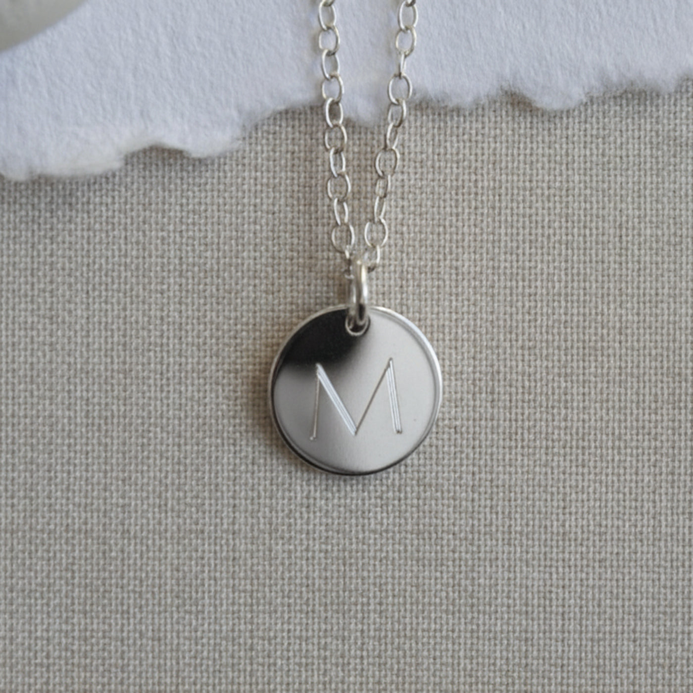 medium silver initial necklace. lulu and belle