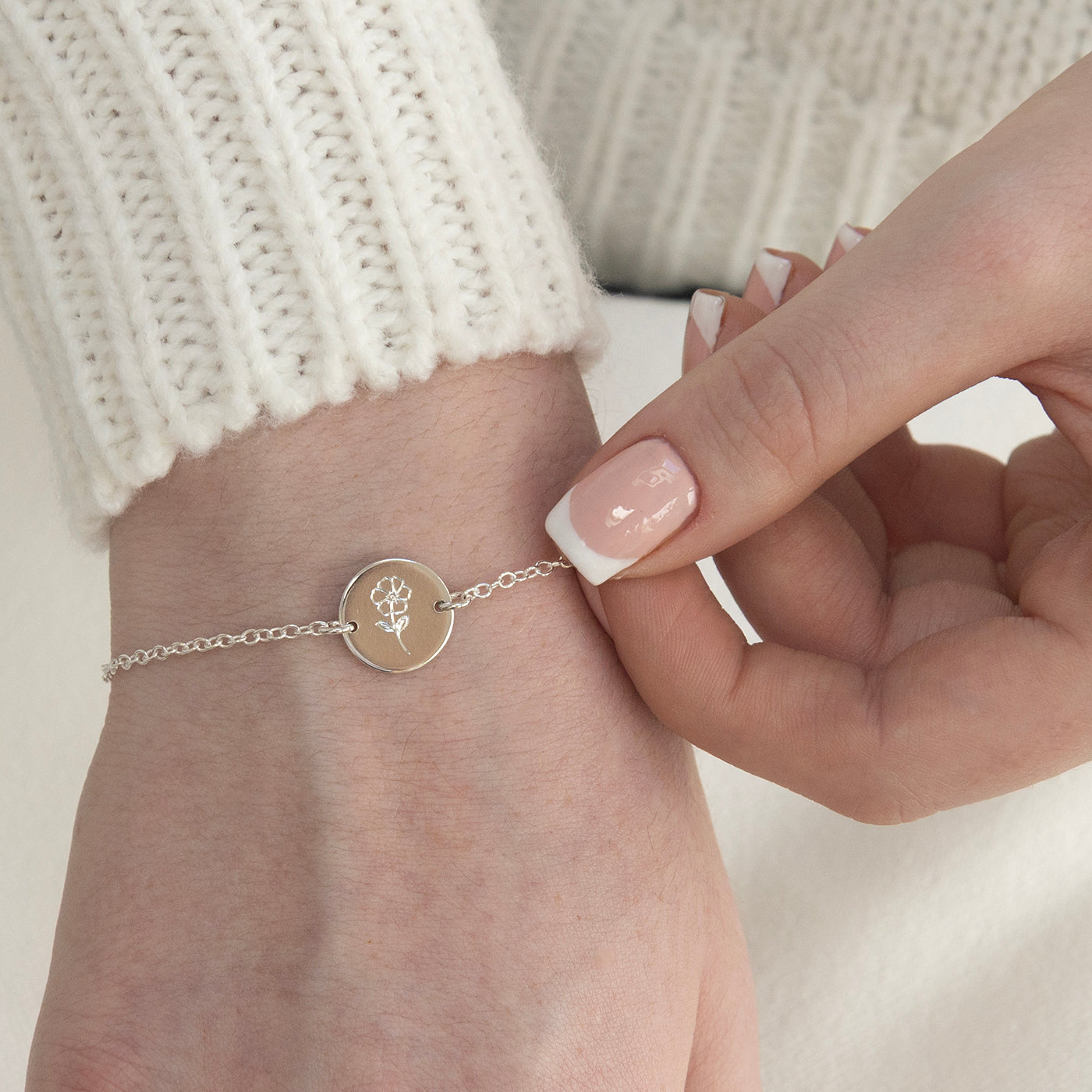 june birthflower bracelet in silver on a model 