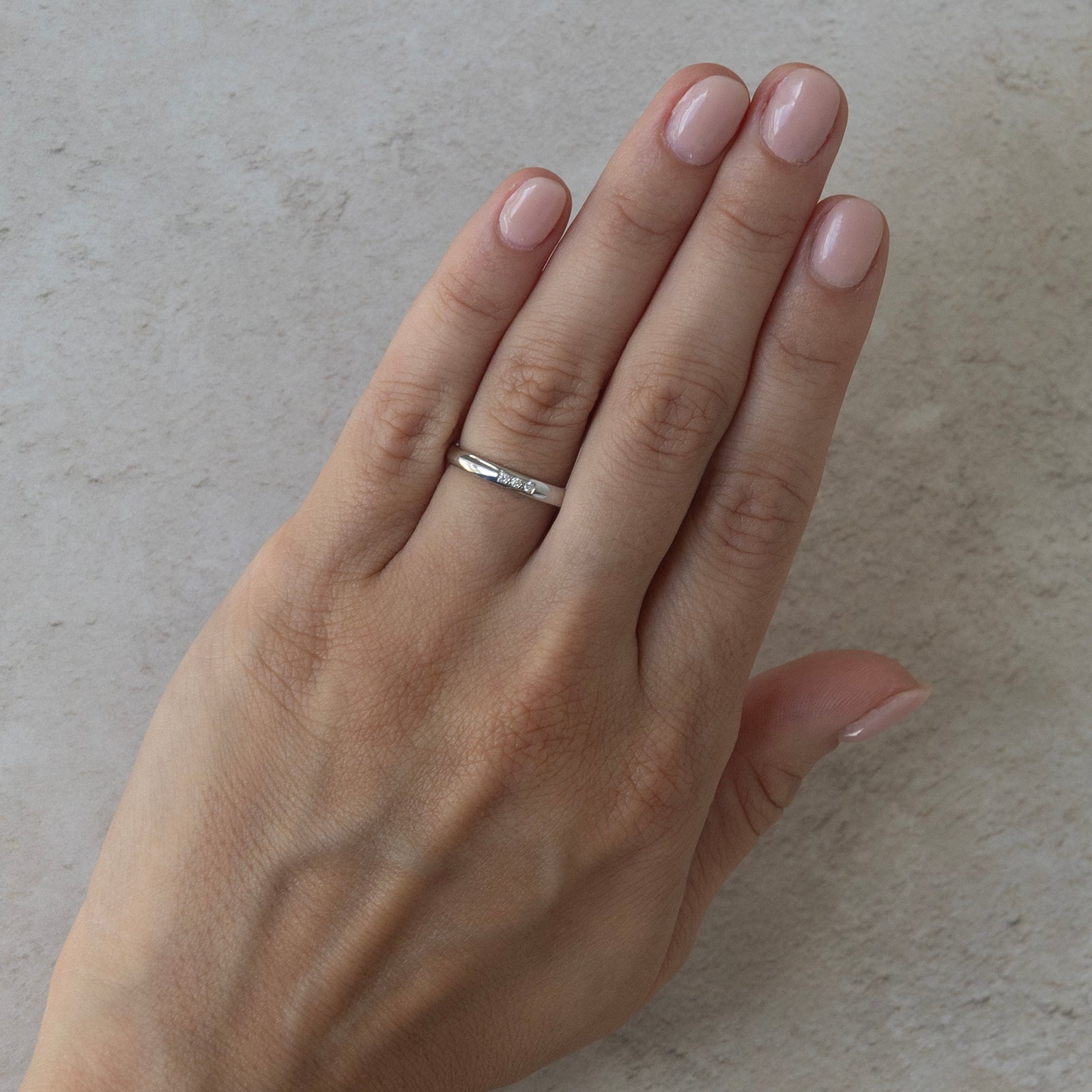 the anam cara wedding ring on a model 