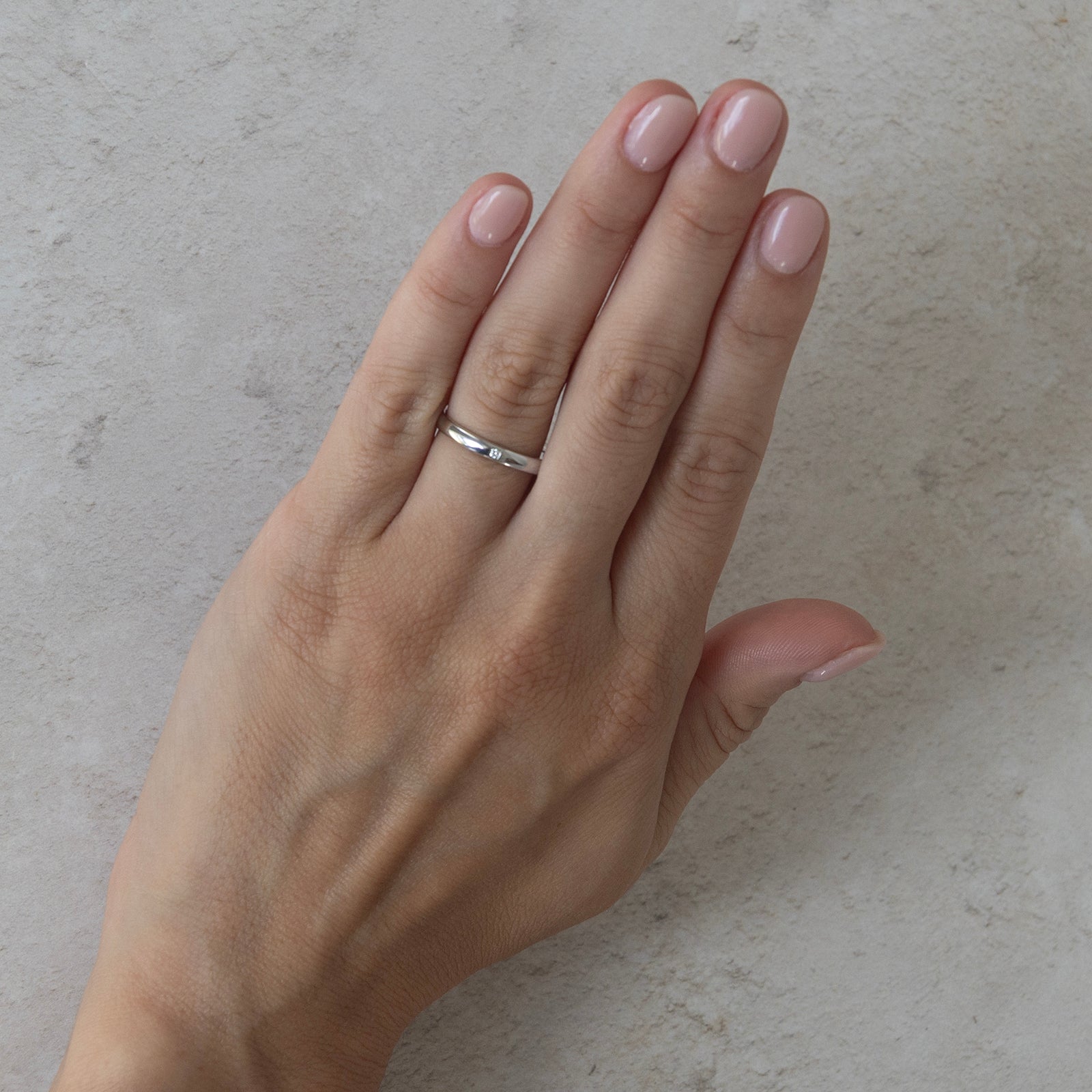 the solas wedding ring on a model 