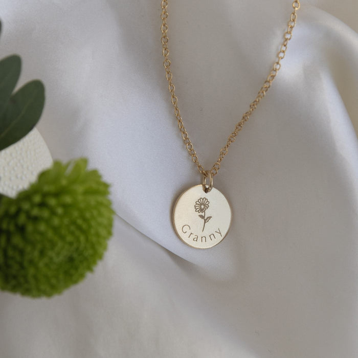 Gold necklace engraved Granny with a birth flower